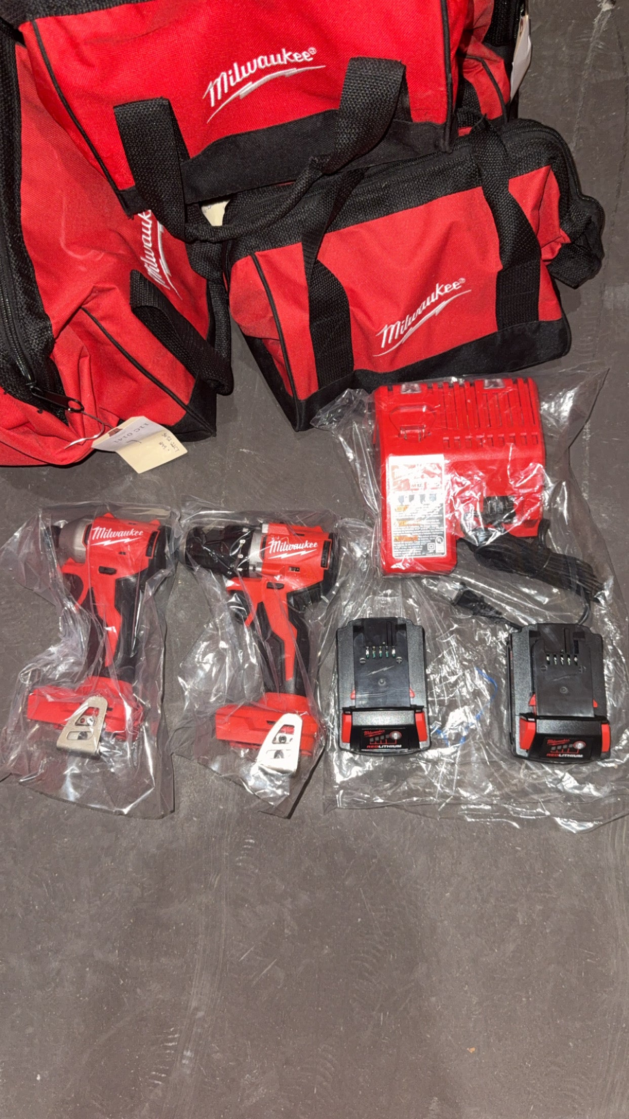 Milwaukee M18 Cordless Drill & Impact Driver Combo Kit w/ Batteries, Charger & Bags